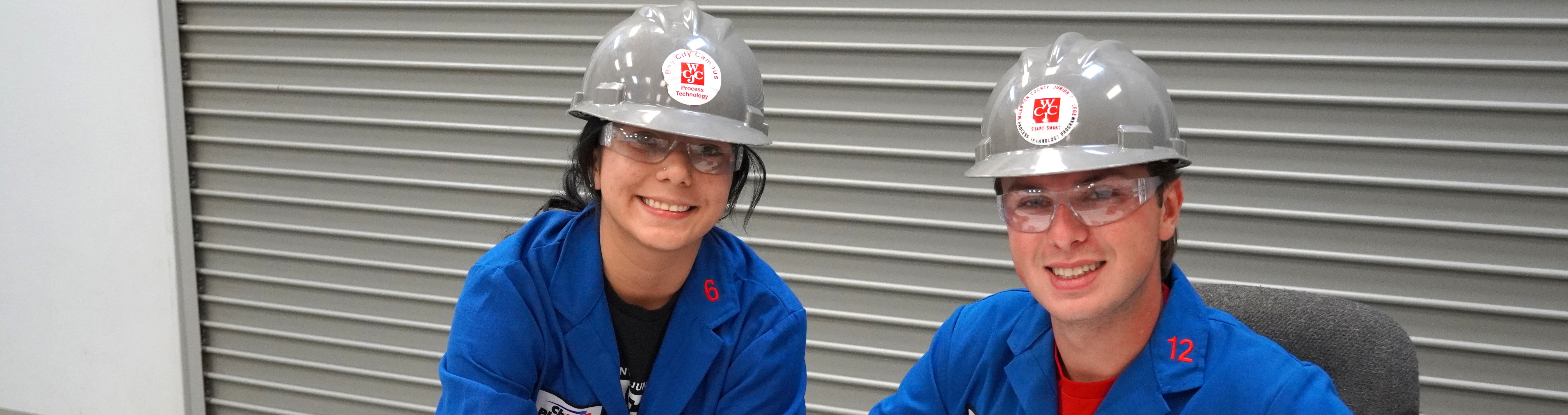 2 students in hard hats